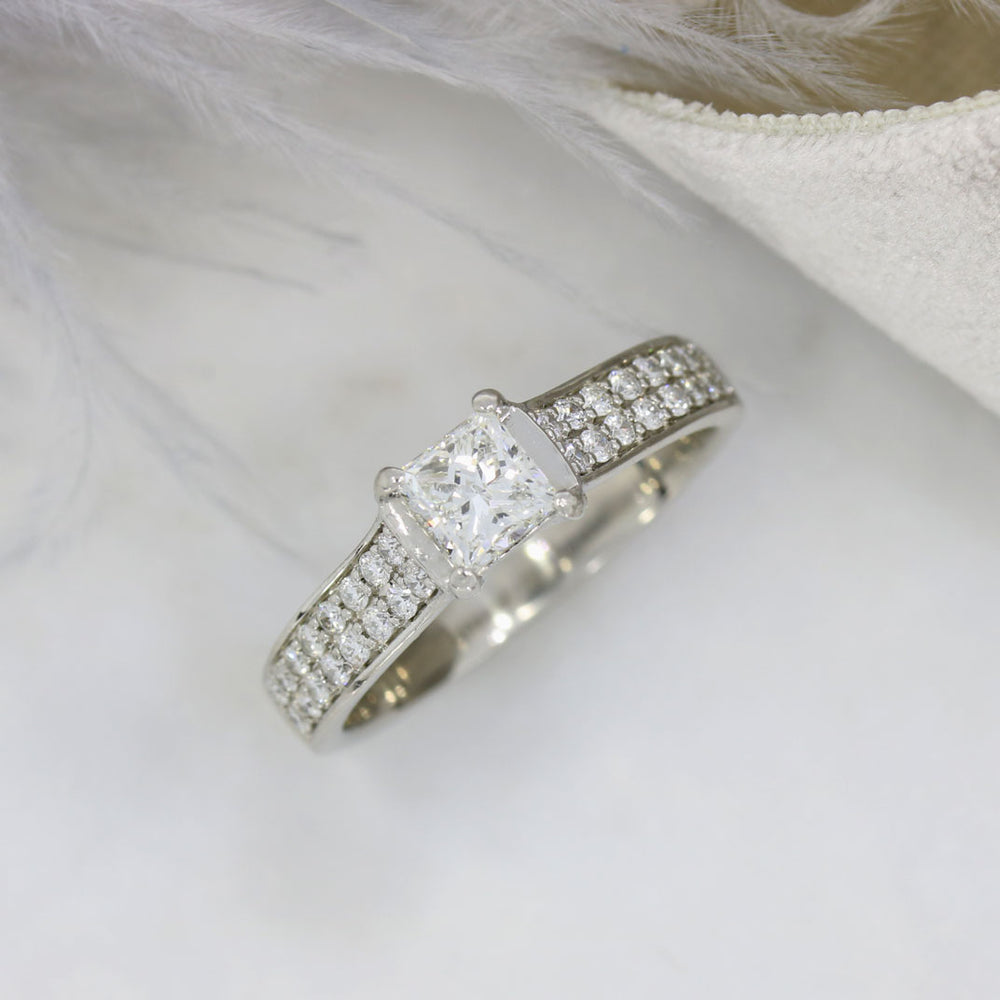 Pre Owned Platinum Princess Cut Diamond Solitaire Ring with Double Row Diamond Shoudlers