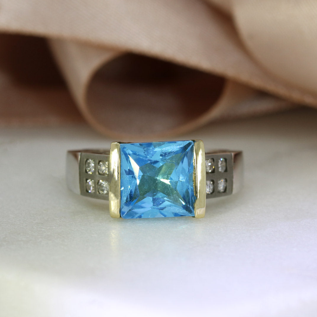 Pre Owned 9ct Blue Topaz Ring with Diamond Set Shoulders