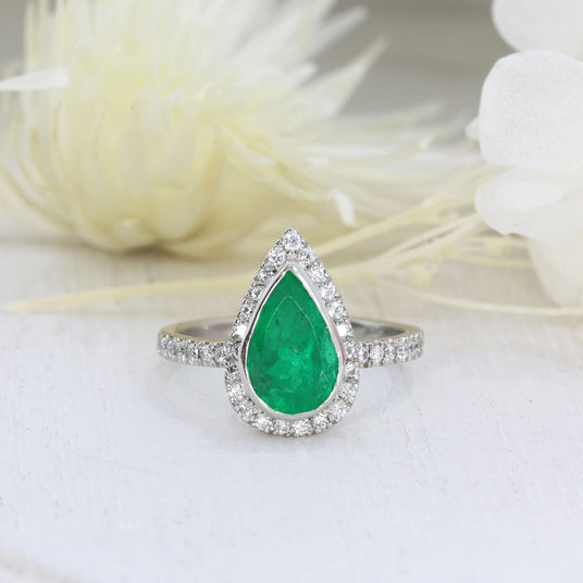 Pre Owned Platinum Pear Shape Emerald & Diamond Halo