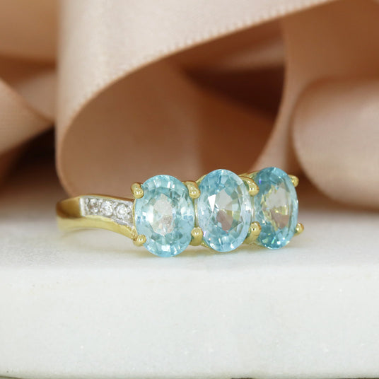 Pre Owned 9ct Gold Claw Set Oval Aquamarine & Diamond 3 Stone Ring