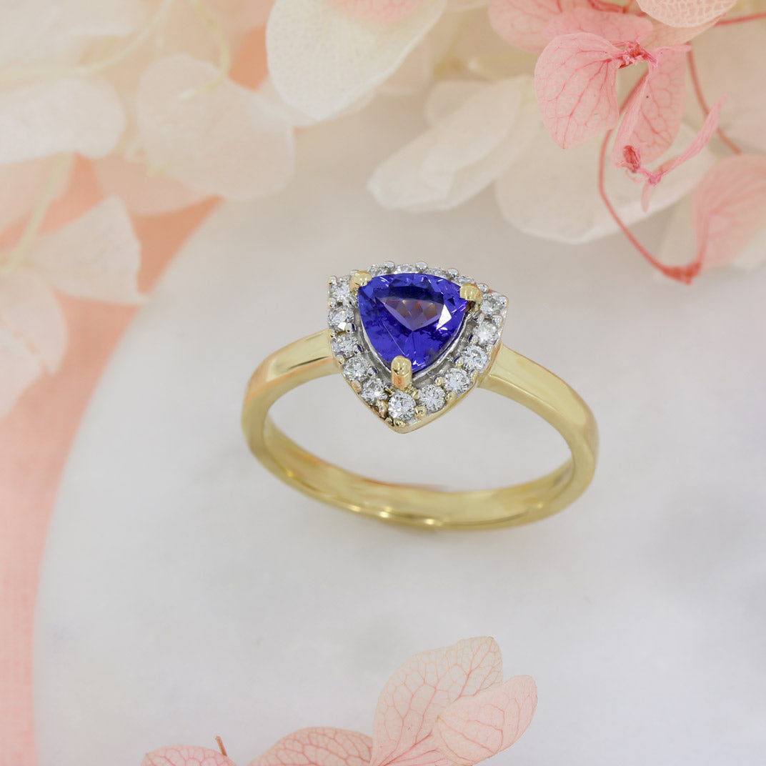 Pre Owned 18ct Yellow Gold Trillian Cut Tanzanite & Round Diamond Halo Ring