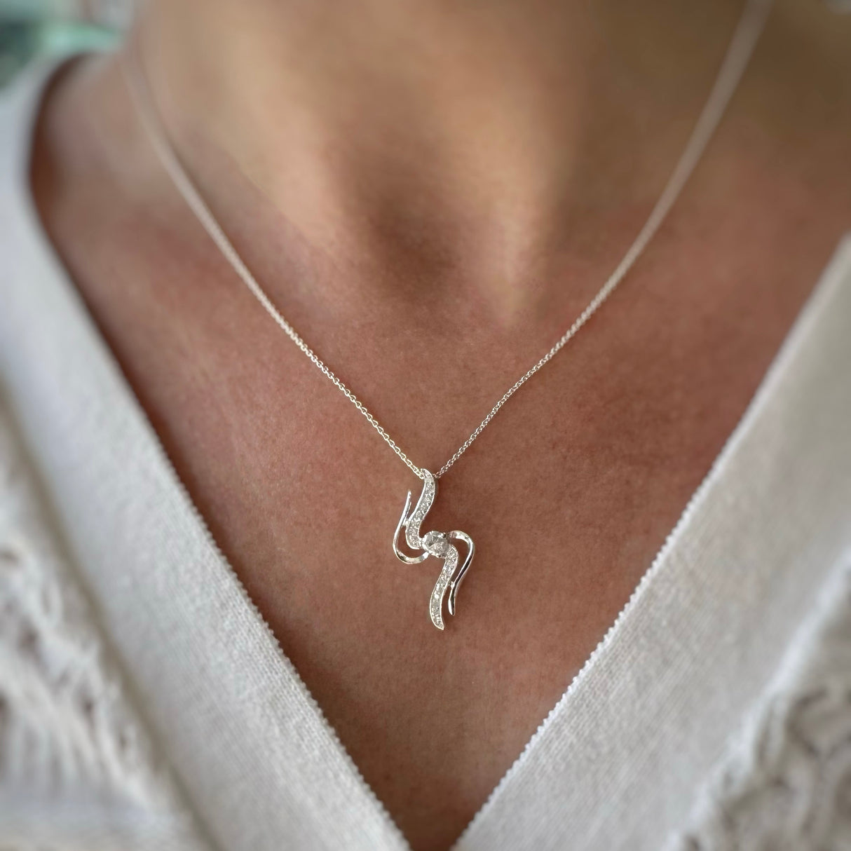 Silver 2 S Shape Ribbons With Centre CZ Pendant