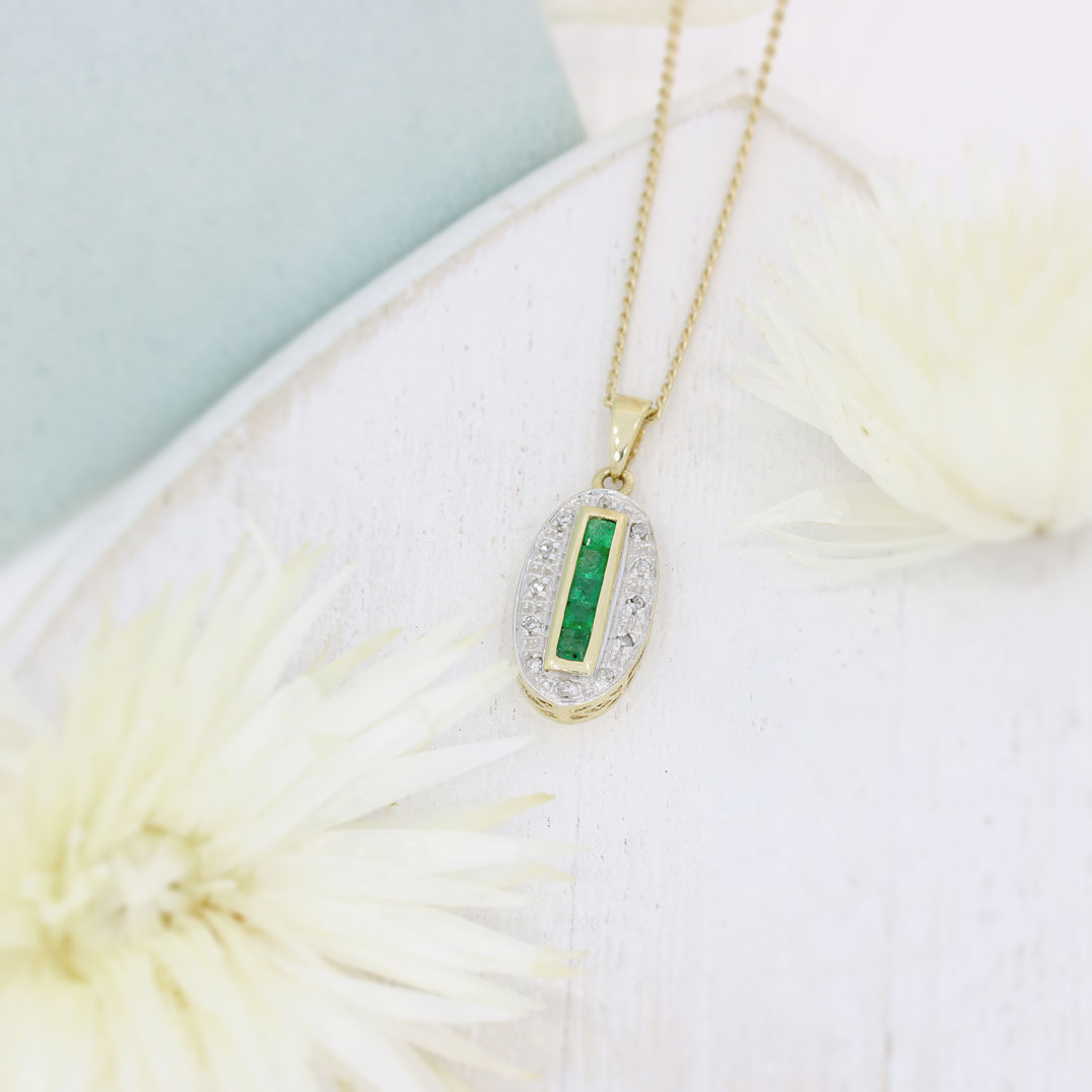 9ct Yellow Gold Oval Emerald & Diamond Pendant on a 9ct Gold 18" Curb Chain
