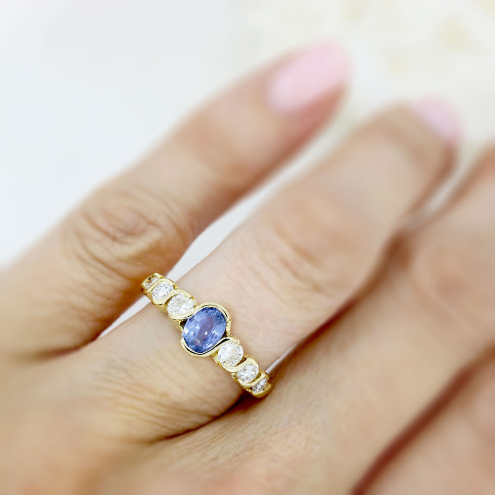 18ct Yellow Oval Sapphire Ring With 3 Graduating Diamonds On Each Side