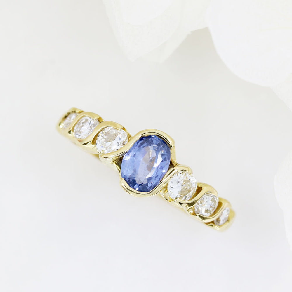 18ct Yellow Oval Sapphire Ring With 3 Graduating Diamonds On Each Side