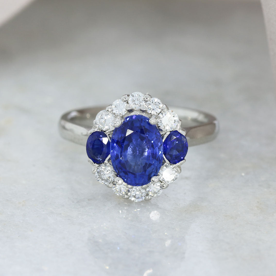 Platinum Sapphire & Diamond Cluster Ring Centre Sapphire 2.58ct Diamonds 0.28ct Valued at £7150