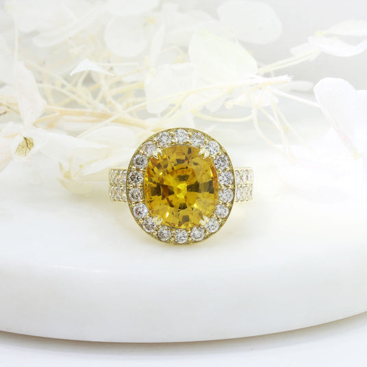 Pre Owned 18ct Gold 8.80ct Yellow Sapphire & Diamond Halo Ring