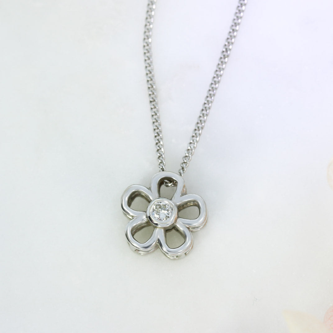 9ct White Gold Diamond Flower Pendant on Curb Chain