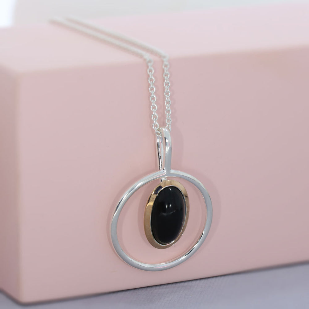 Silver Round Open Pendant Set With Black Onyx & Rose Gold Detail
