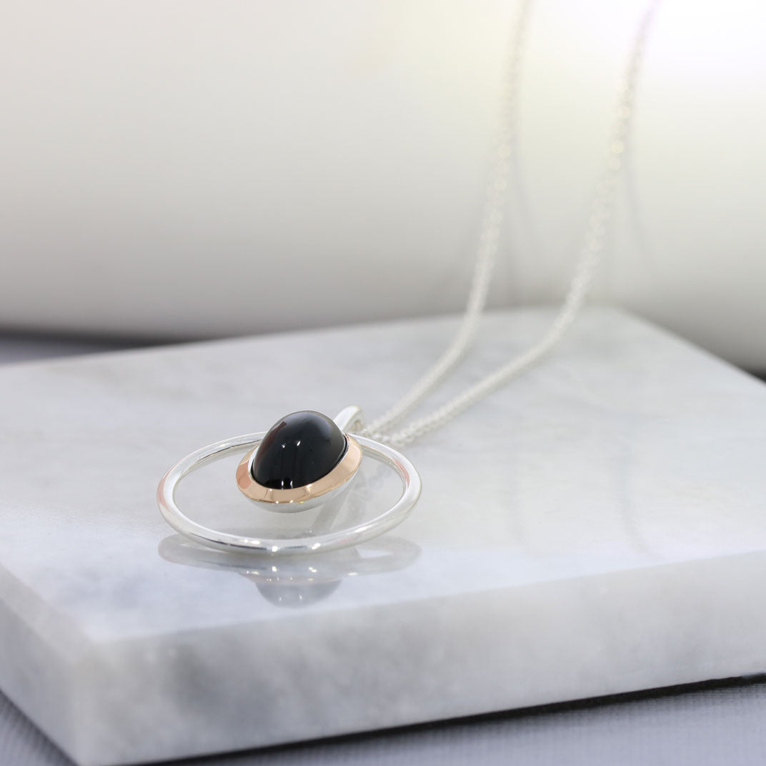 Silver Round Open Pendant Set With Black Onyx & Rose Gold Detail