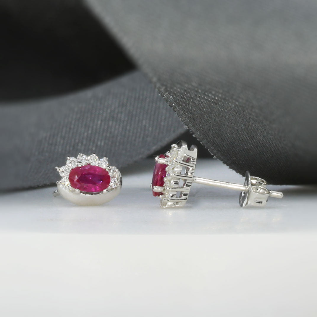 9ct White Gold Oval Ruby Earrings With Claw Set Diamonds