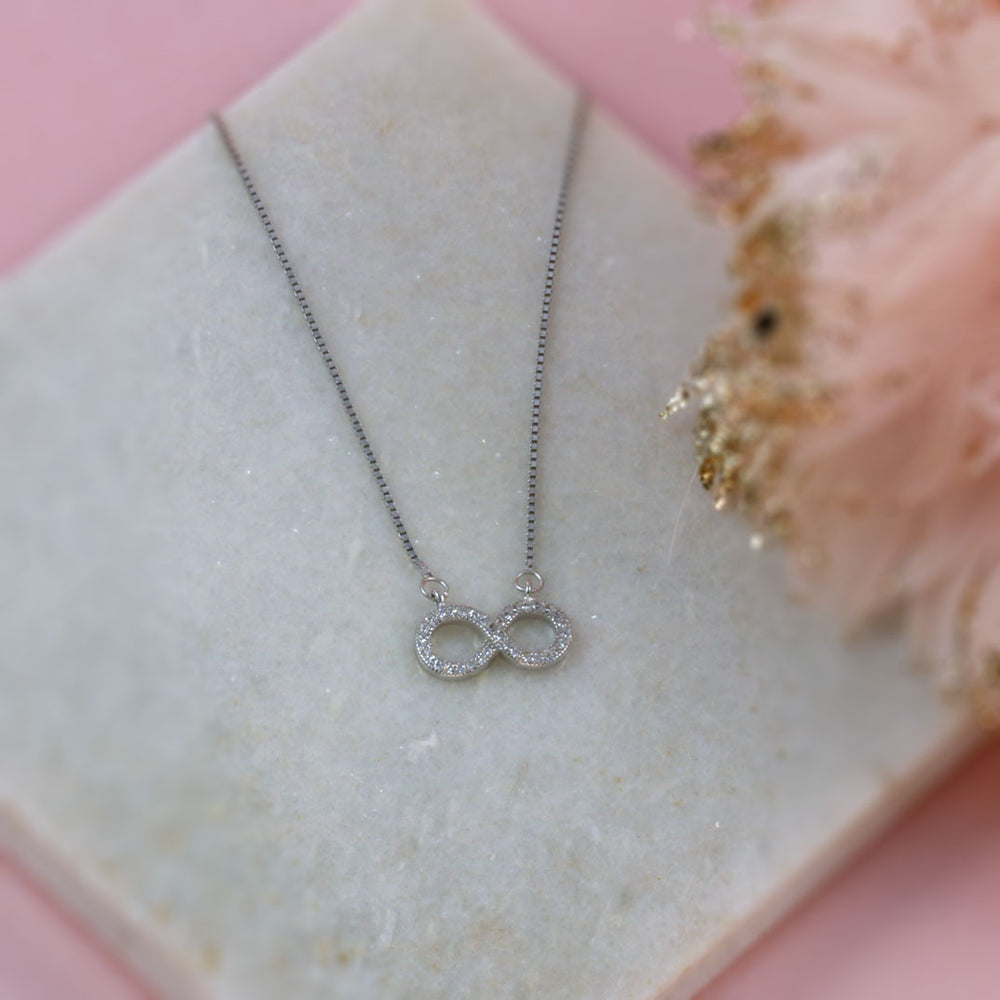 Silver Infinity Necklace with Pave Set Cubic Zirconia