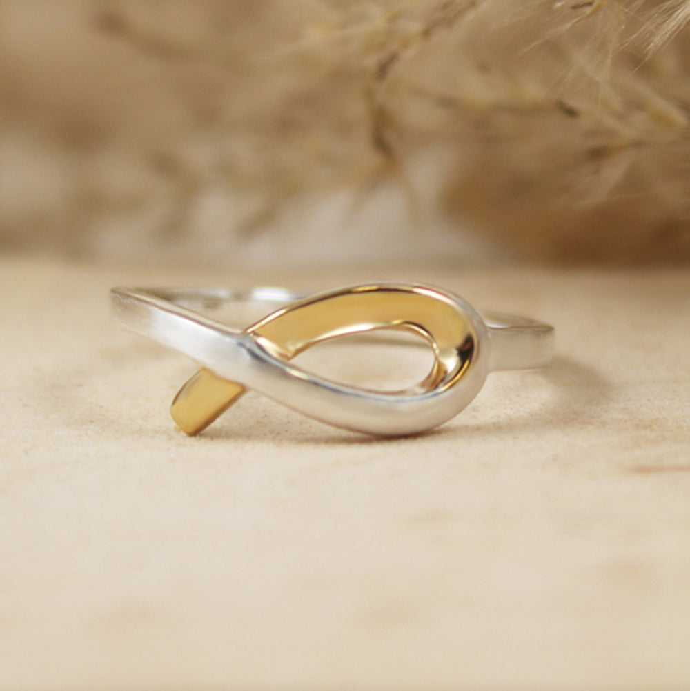 Silver Ribbon Style Ring with Yellow Gold Accent