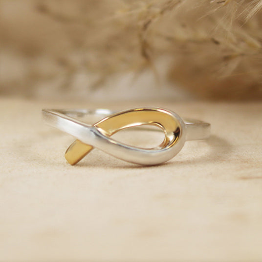 Silver Ribbon Style Ring with Yellow Gold Accent