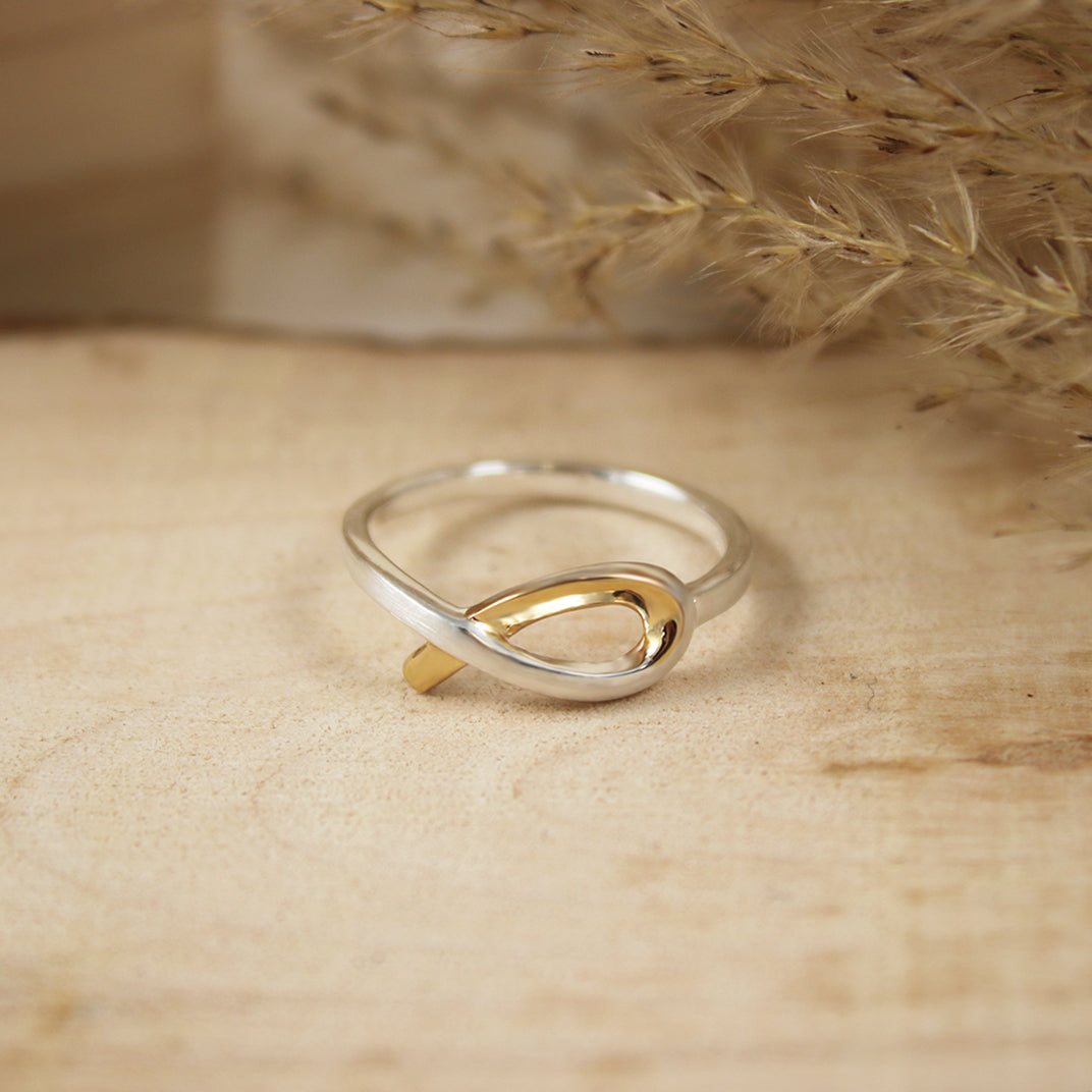 Silver Ribbon Style Ring with Yellow Gold Accent