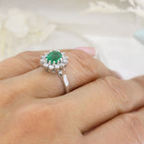 18ct White Gold Oval Claw Set Emerald & Diamond Cluster Ring