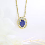 18ct Yellow Gold Oval Claw Set Sapphire Pendant with Pave Set Diamond Halo Pendent & Chain