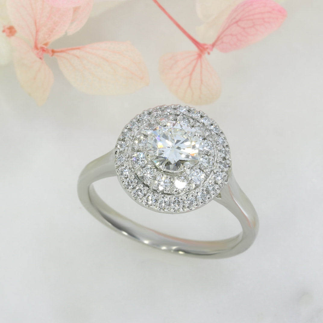 Pre Owned Platinum Diamond Solitaire Ring with a Double Halo total 1.10ct