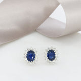 9ct White Gold Oval Claw Set Sapphire & Diamond Cluster Earrings