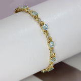 Pre Owned 9ct Yellow Gold Blue Topaz & Diamond Bracelet