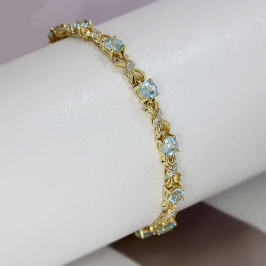 Pre Owned 9ct Yellow Gold Blue Topaz & Diamond Bracelet