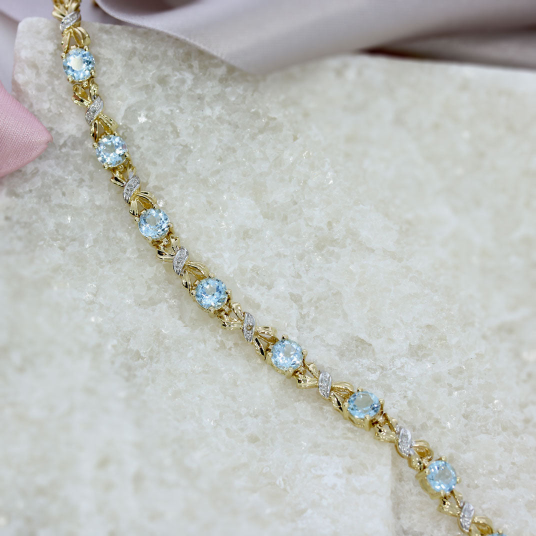 Pre Owned 9ct Yellow Gold Blue Topaz & Diamond Bracelet