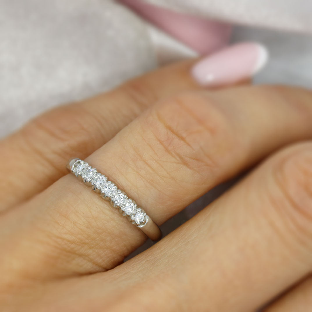 Platinum Claw Set 7 Stone Diamond Eternity Ring 0.20ct