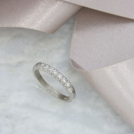 Platinum Claw Set 7 Stone Diamond Eternity Ring 0.20ct