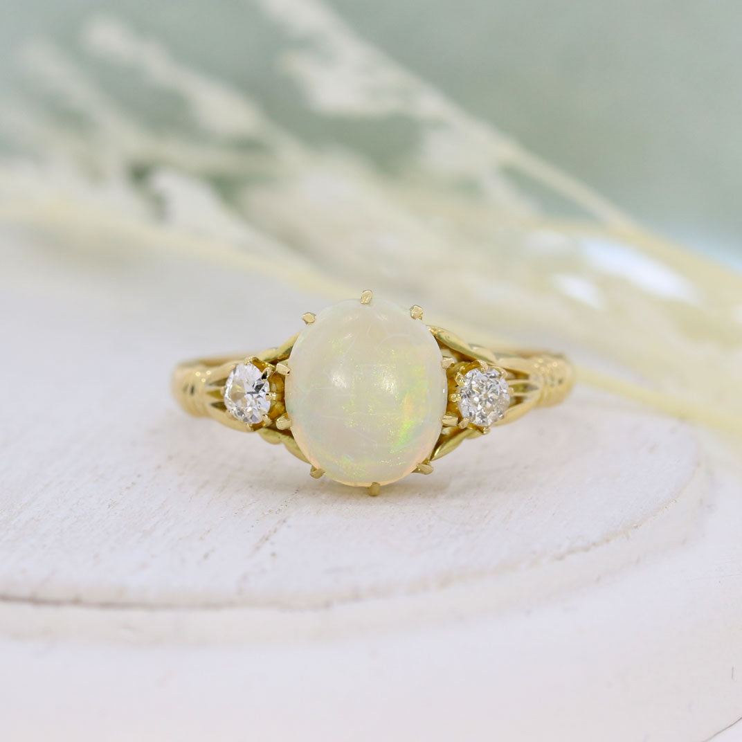Pre Owned 18ct Yellow Gold Oval Opal & Round Diamond Ring