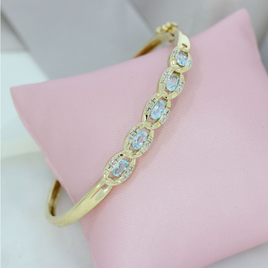 Pre Owned 9ct Yellow Gold Hinged Bangle with Blue Topaz & Diamonds