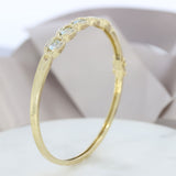 Pre Owned 9ct Yellow Gold Hinged Bangle with Blue Topaz & Diamonds