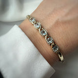 Pre Owned 9ct Yellow Gold Hinged Bangle with Blue Topaz & Diamonds