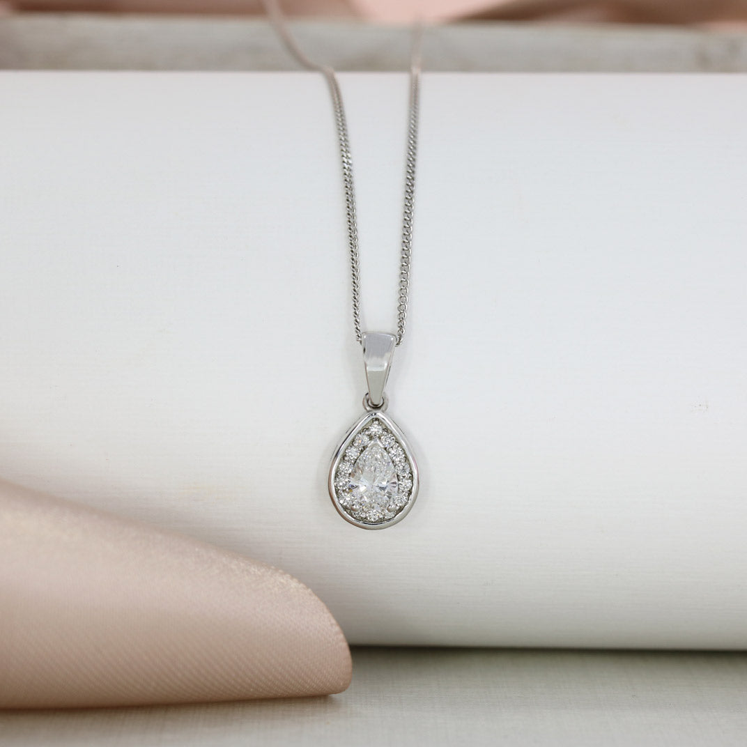 18ct White Gold Pear Shaped Diamond Halo Pendant on an 18ct 18inch White Gold Chain