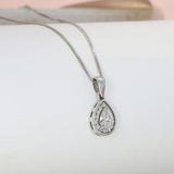 18ct White Gold Pear Shaped Diamond Halo Pendant on an 18ct 18inch White Gold Chain