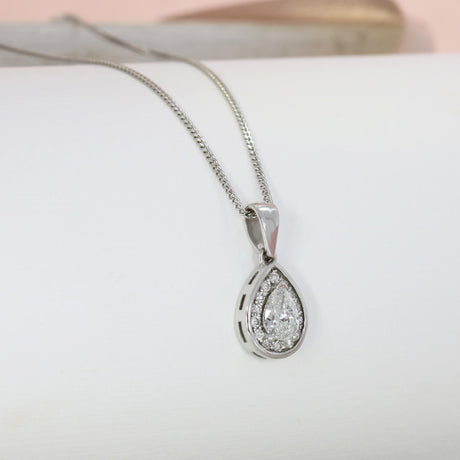 18ct White Gold Pear Shaped Diamond Halo Pendant on an 18ct 18inch White Gold Chain