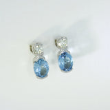 9ct White Gold Trap Set Oval Aquamarine & Round Diamond Stud Earrings