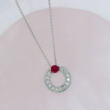 9ct White Gold Ruby & Diamond Open Circle Pendant on an 18inch White Gold Chain