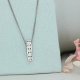 18ct White Gold 5 Stone Channel Set Diamond Pendant on 18ct Gold Chain