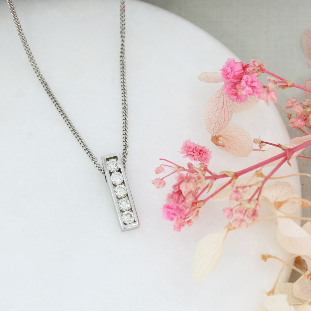 18ct White Gold 5 Stone Channel Set Diamond Pendant on 18ct Gold Chain