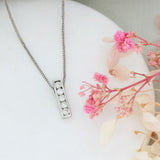 18ct White Gold 5 Stone Channel Set Diamond Pendant on 18ct Gold Chain