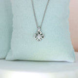 18ct Gold Diamond Flower Style Pendant on a 9ct White Gold 16" Chain