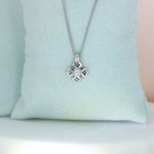 18ct Gold Diamond Flower Style Pendant on a 9ct White Gold 16" Chain