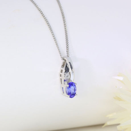 18ct Gold Tanzanite & Diamond Pendent on a 9ct 18inch Chain