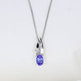 18ct Gold Tanzanite & Diamond Pendent on a 9ct 18inch Chain