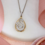 18ct Rose and White Gold Teardrop Pendant With Fancy Diamond Swirl Detail