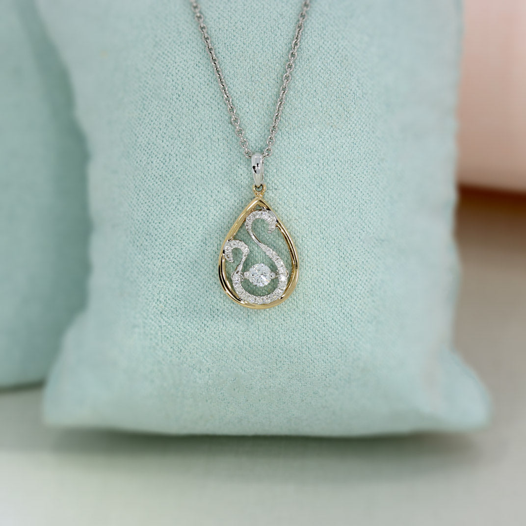 18ct Rose and White Gold Teardrop Pendant With Fancy Diamond Swirl Detail