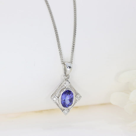 9ct White Gold Tanzanite & Diamond Pendant on a 9ct 16Inch Chain