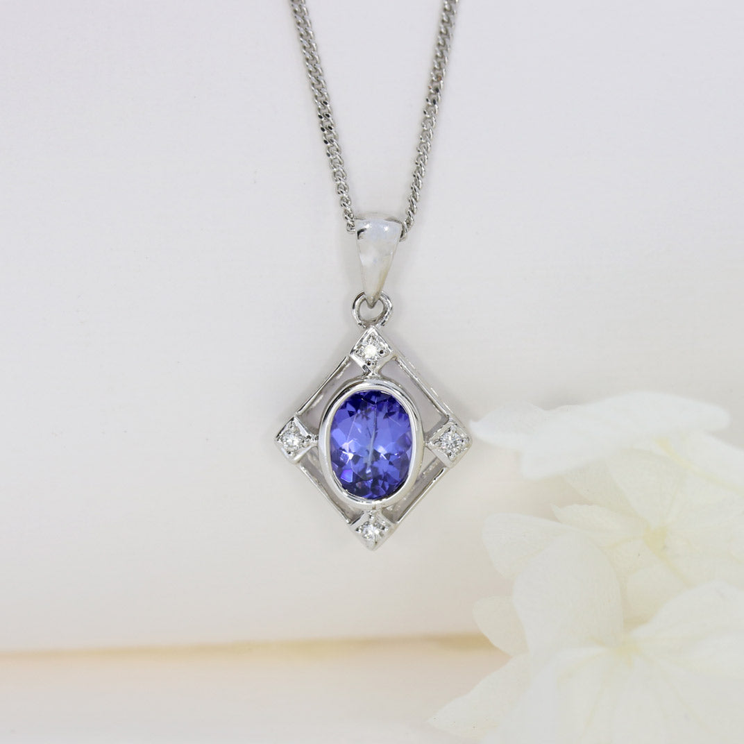 9ct White Gold Tanzanite & Diamond Pendant on a 9ct 16Inch Chain