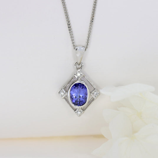 9ct White Gold Tanzanite & Diamond Pendant on a 9ct 16Inch Chain