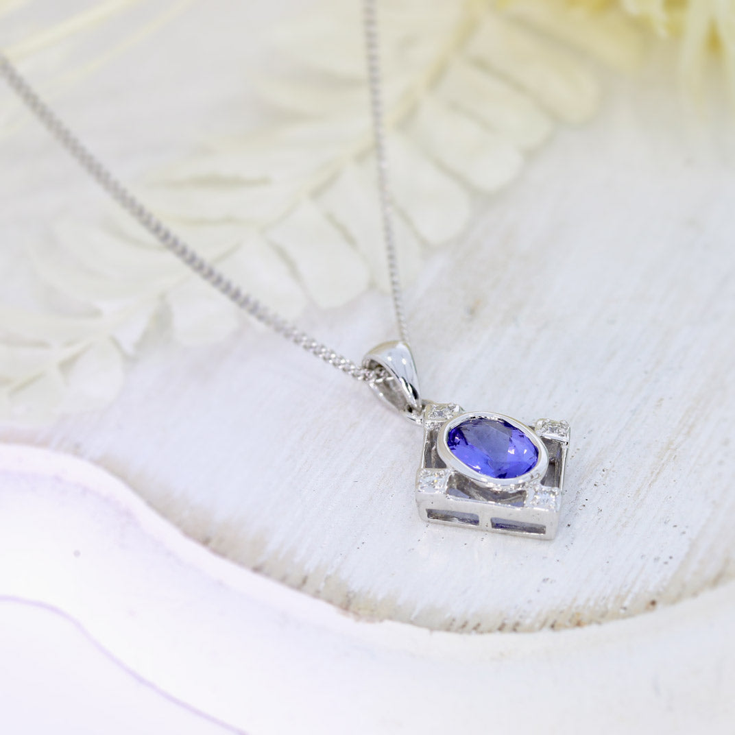 9ct White Gold Tanzanite & Diamond Pendant on a 9ct 16Inch Chain